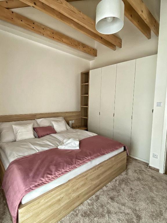 Postel nebo postele na pokoji v ubytování Apartments Severka - Jasná