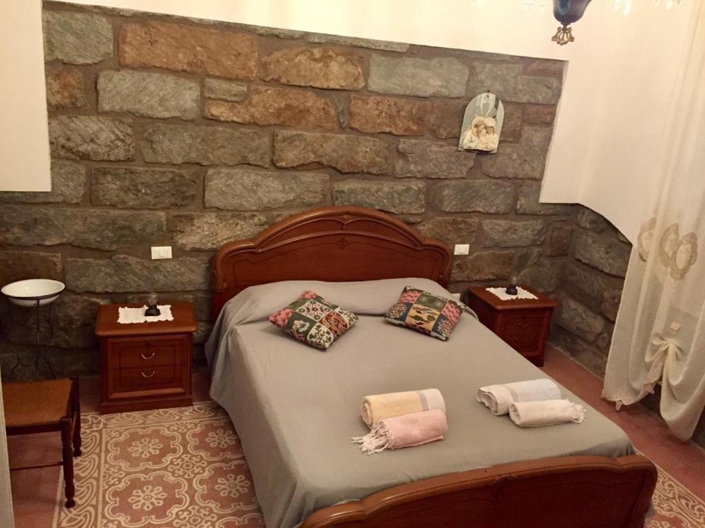 Posteľ alebo postele v izbe v ubytovaní Il giardino di Ale