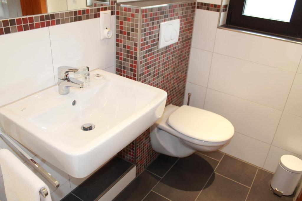 Koupelna v ubytování Hotel Hübler