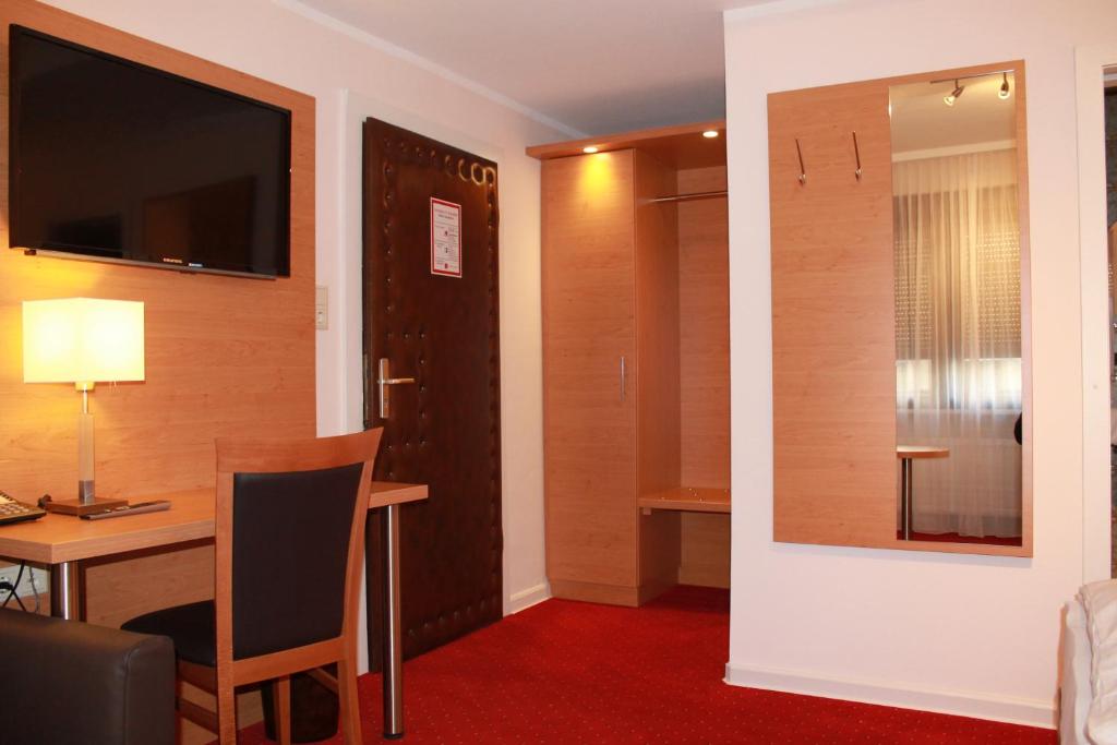 TV a/nebo společenská místnost v ubytování Hotel Hübler
