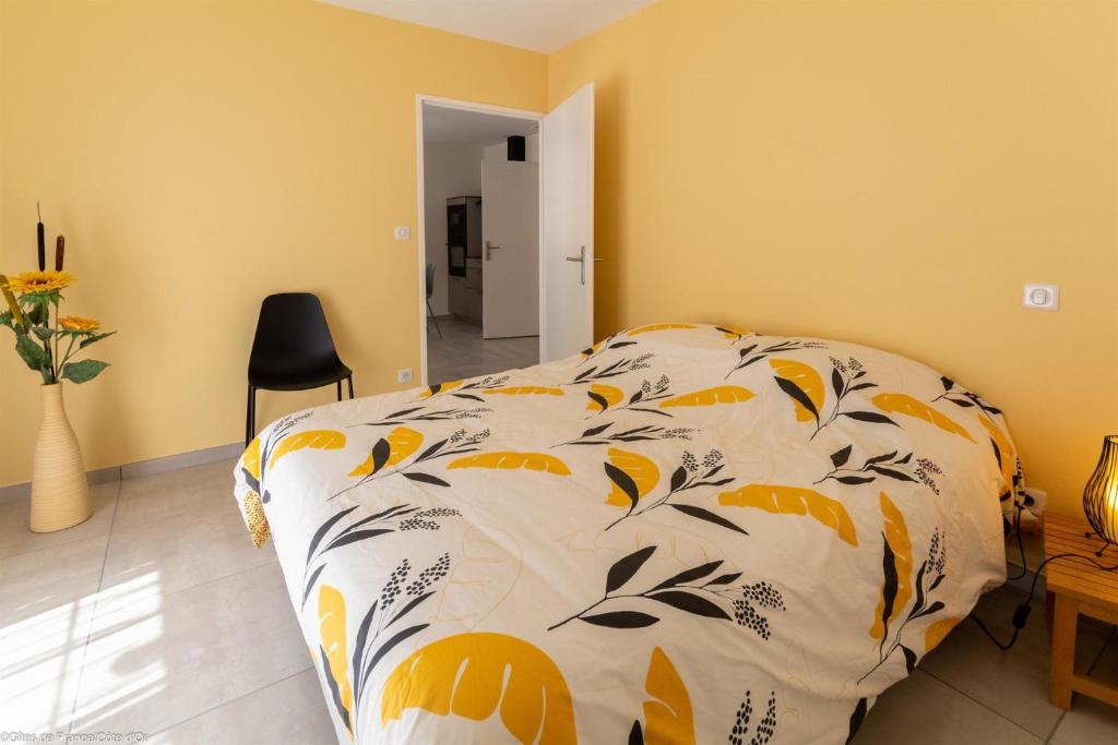 Postel nebo postele na pokoji v ubytování Le Gîte de Mélie