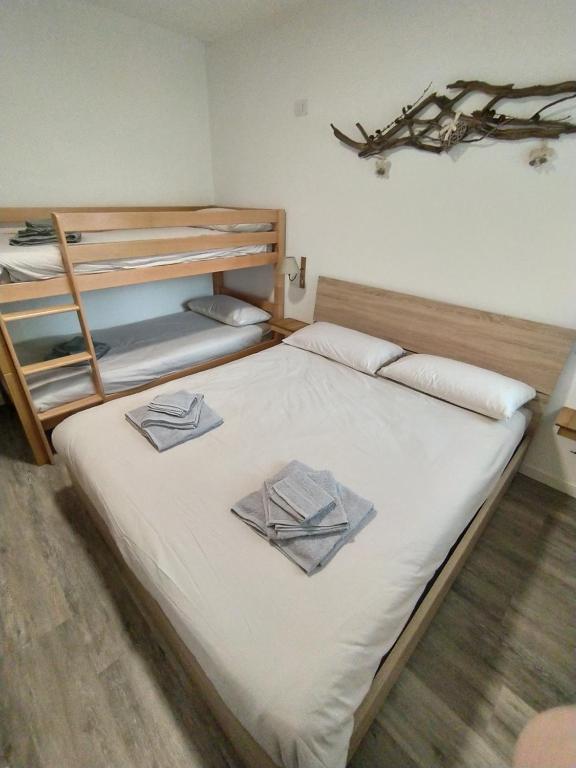 Postel nebo postele na pokoji v ubytování Solimmo