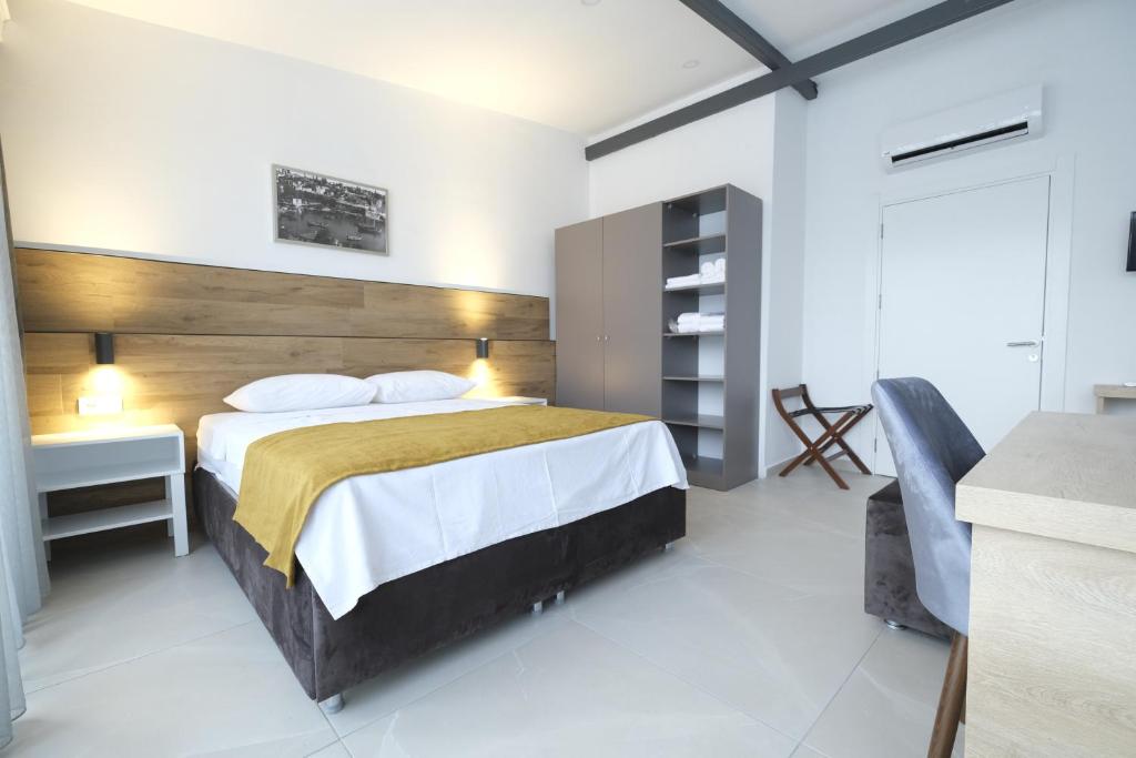 Postel nebo postele na pokoji v ubytování Tut Hotel