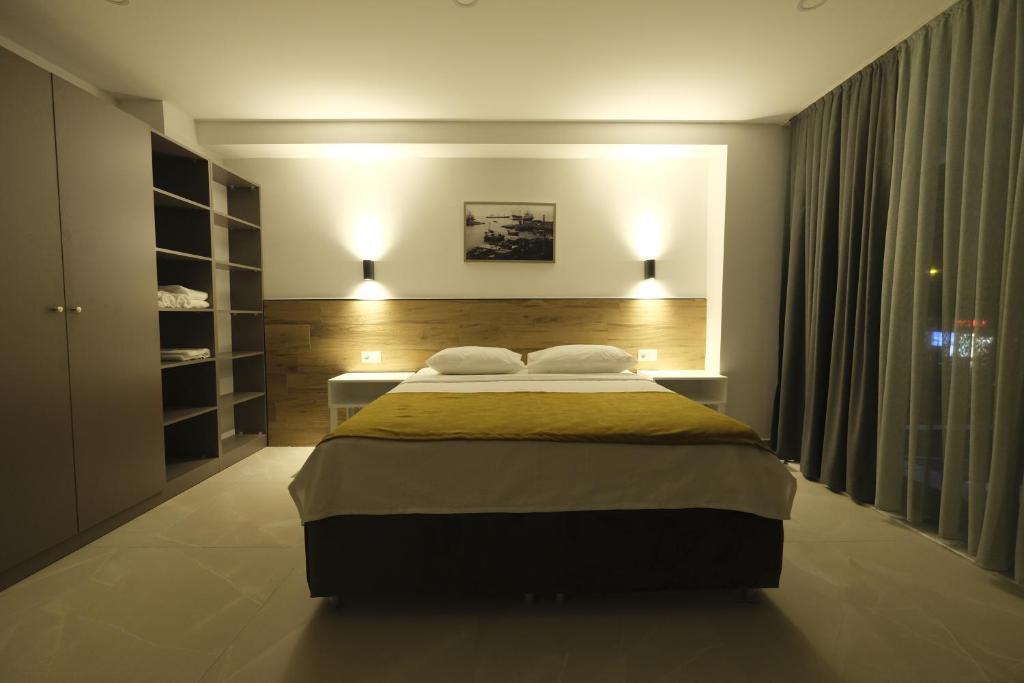 Postel nebo postele na pokoji v ubytování Tut Hotel