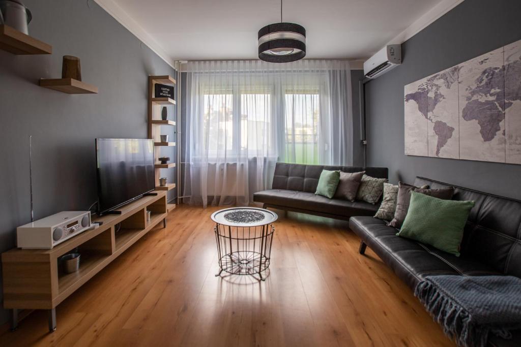 Posezení v ubytování Center Home Apartman