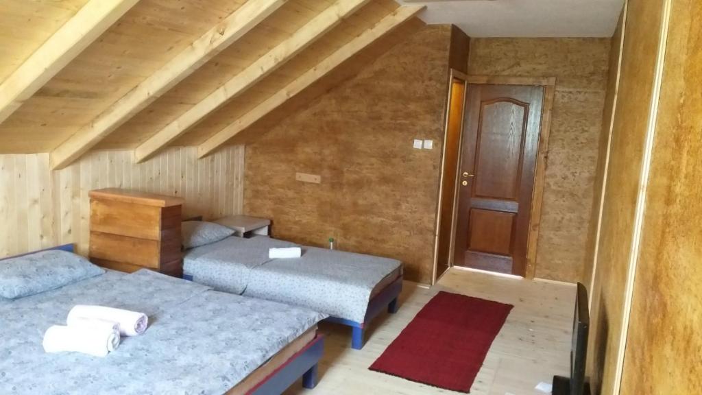 Postel nebo postele na pokoji v ubytování Etno selo ŽURIĆ