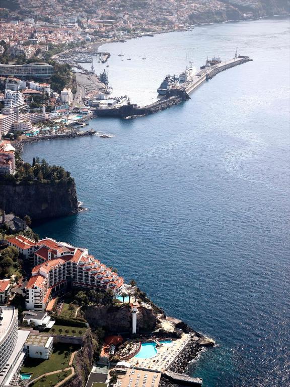 an aerial view of a city and a body of water at The Cliff Bay - PortoBay in Funchal