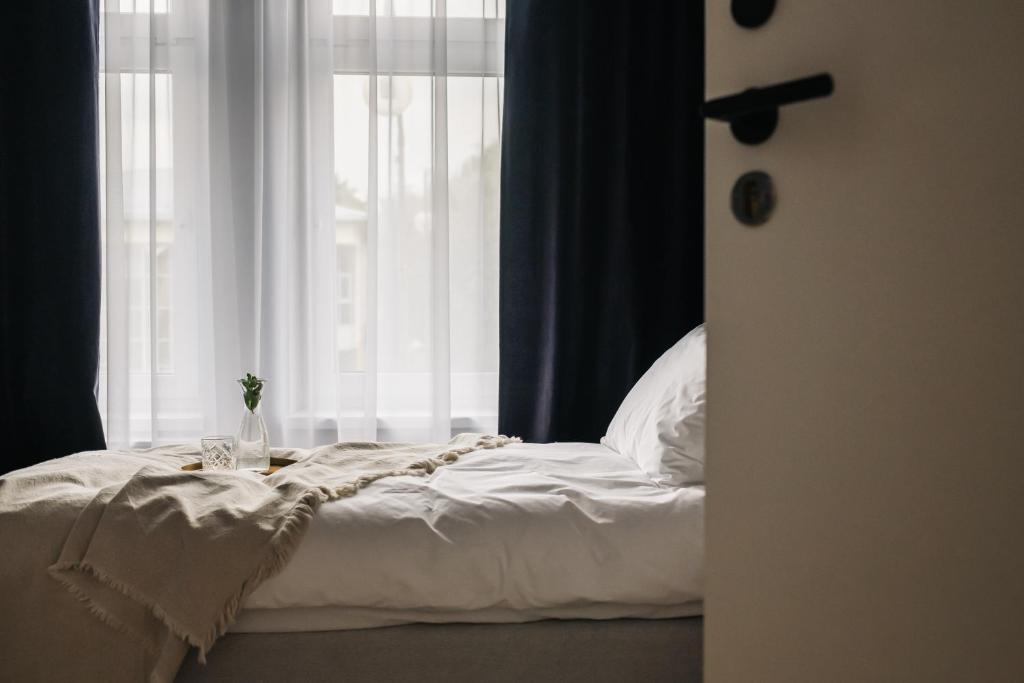 Posteľ alebo postele v izbe v ubytovaní Apartamenty Las