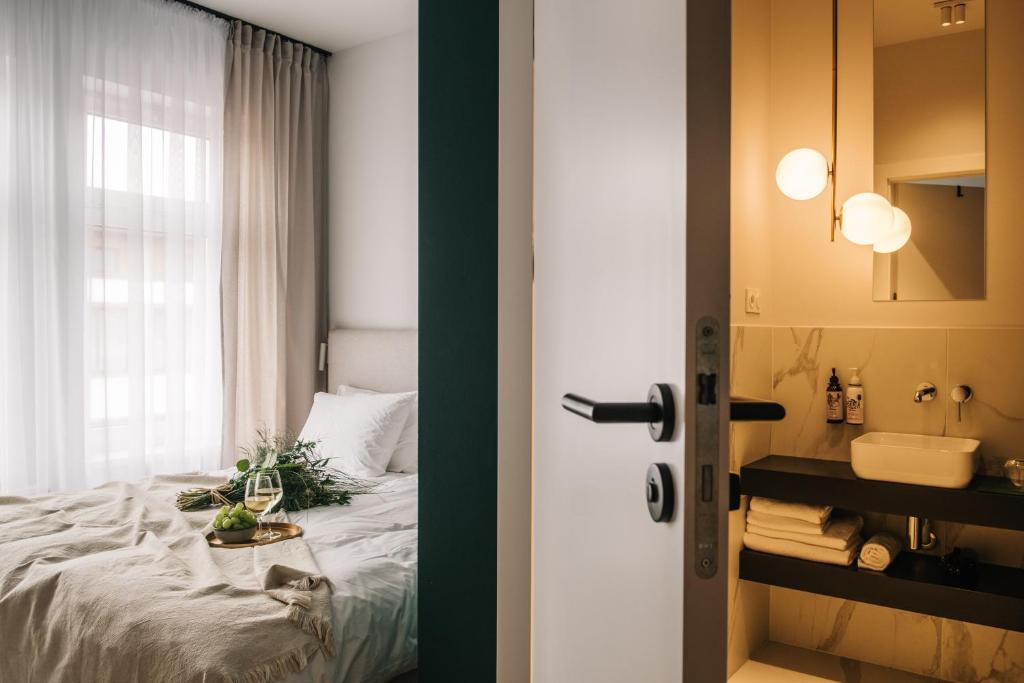 Posteľ alebo postele v izbe v ubytovaní Apartamenty Las