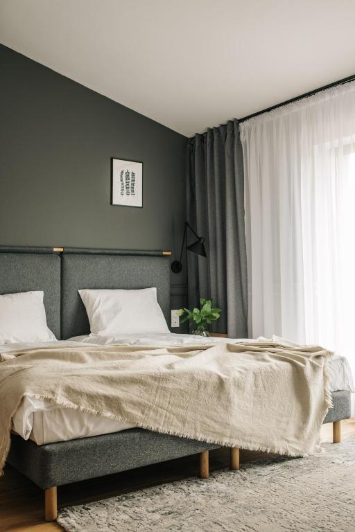Posteľ alebo postele v izbe v ubytovaní Apartamenty Las