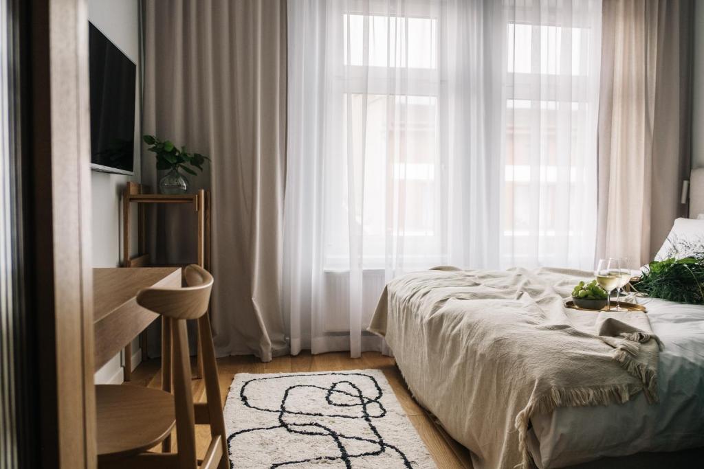 Posteľ alebo postele v izbe v ubytovaní Apartamenty Las