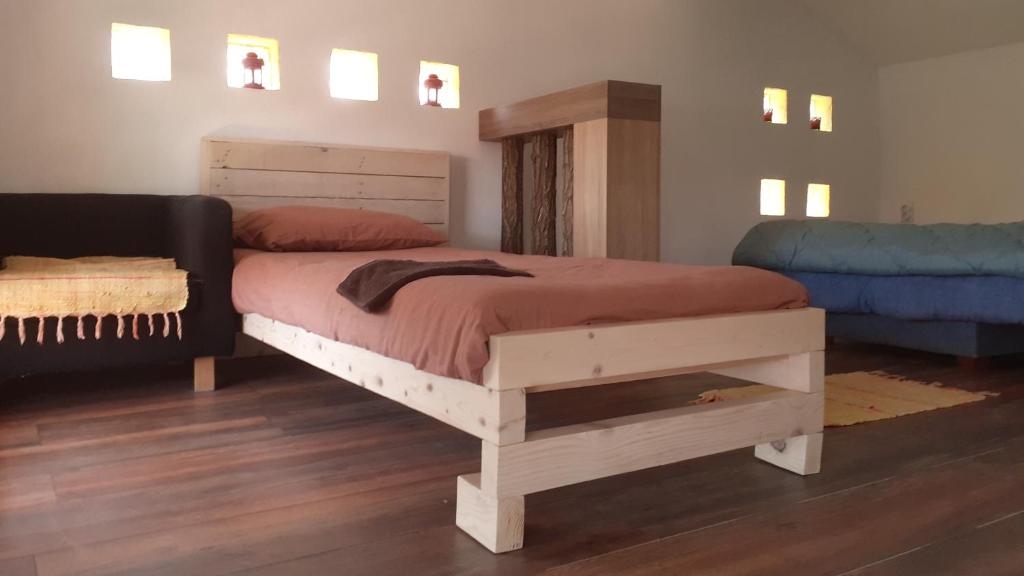 Postel nebo postele na pokoji v ubytování Village house Moo Moo