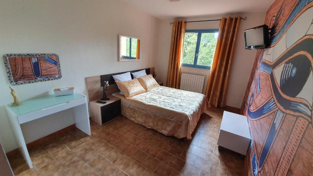 Postel nebo postele na pokoji v ubytování Horus Hôtel