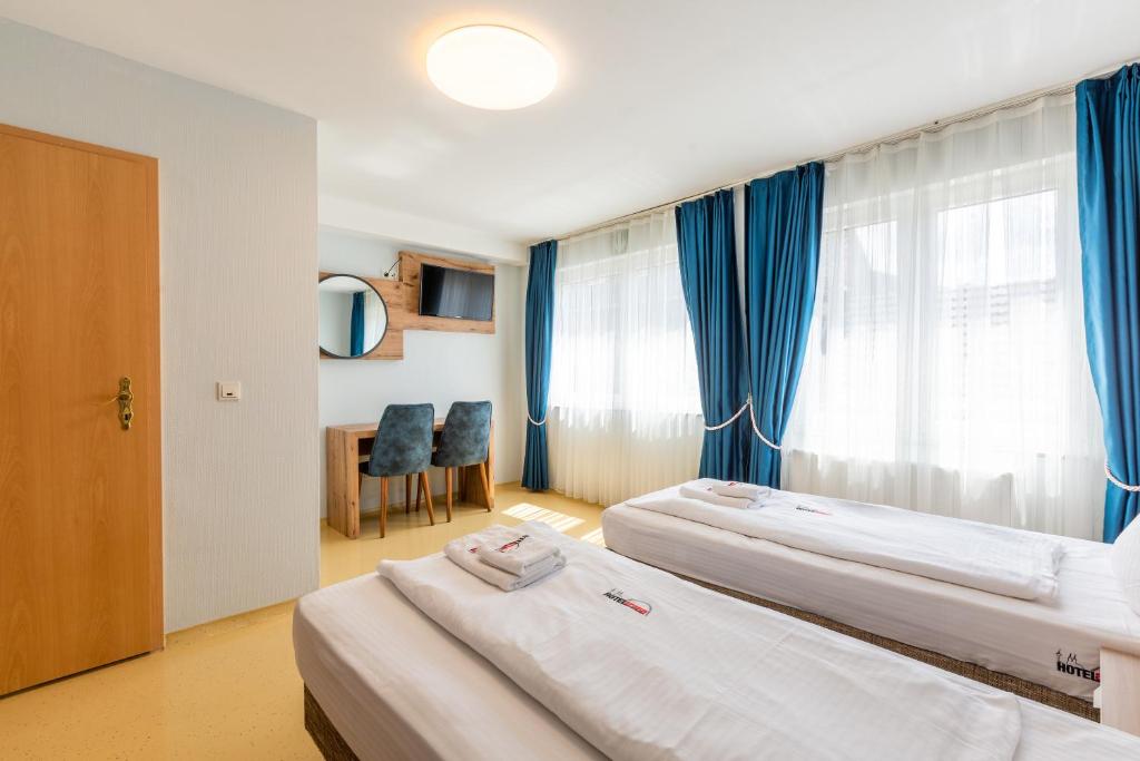 Katil atau katil-katil dalam bilik di Hotel Arena
