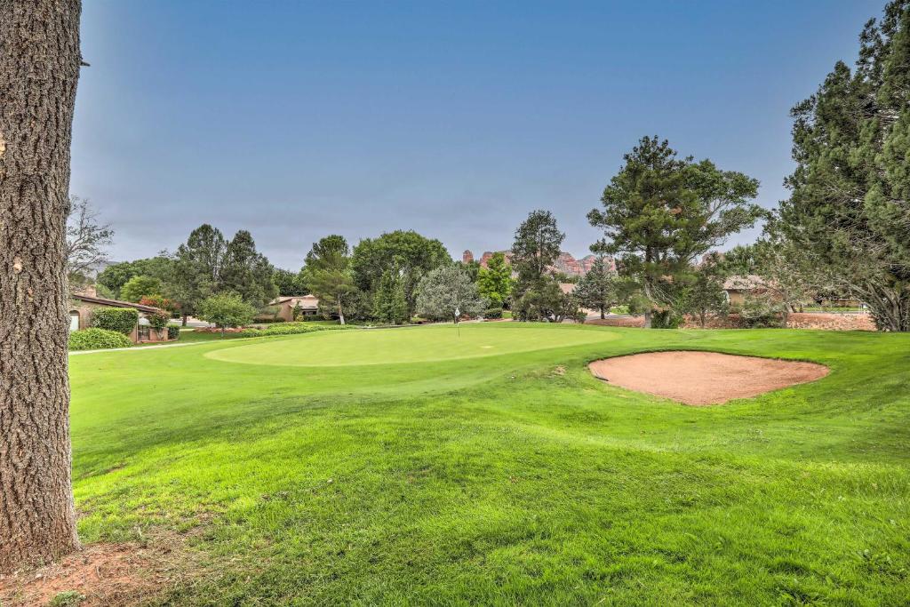 a view of the green at a golf course at Gated Home with Golf Course View and Pool Access! in Sedona