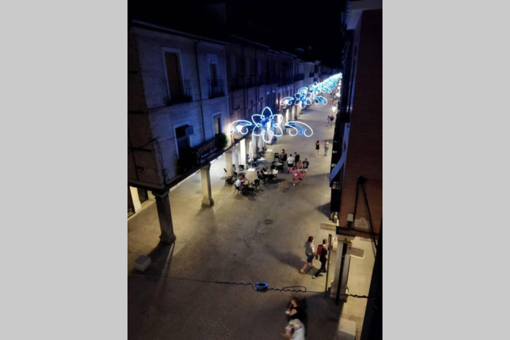 an overhead view of a city street at night at PETIT Home in Alcalá de Henares