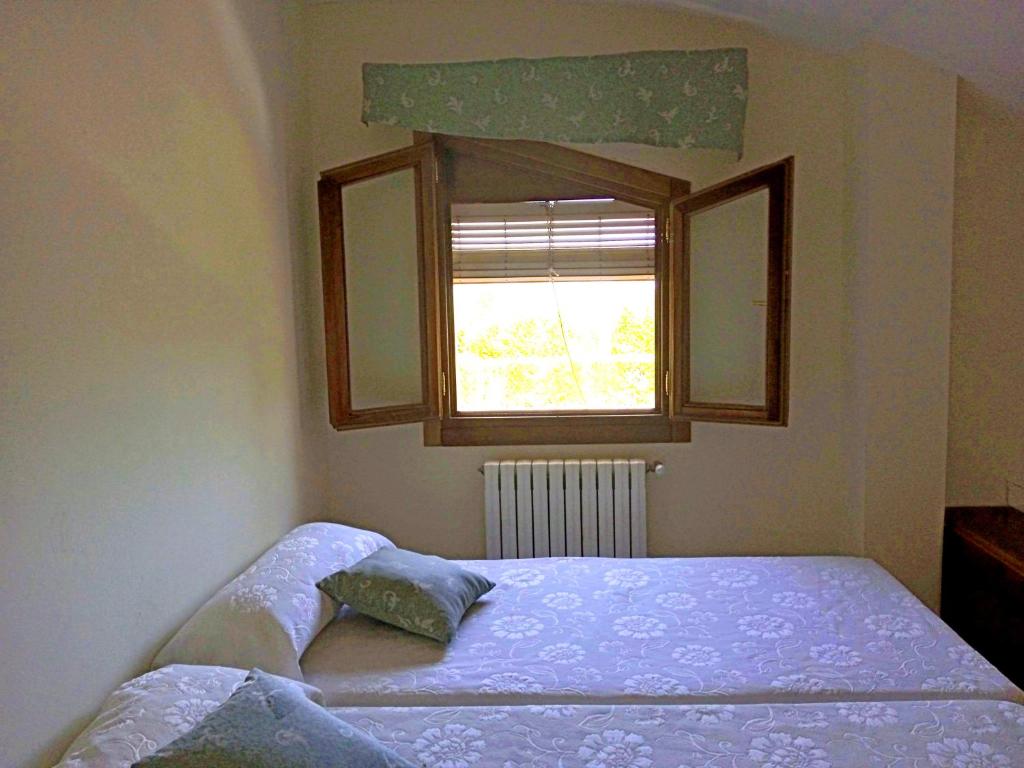 Postel nebo postele na pokoji v ubytování Hotel El Zorro