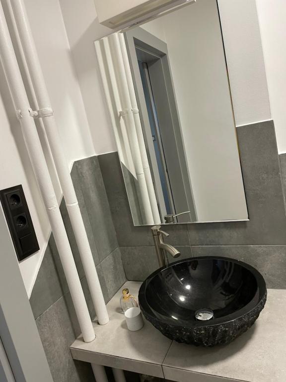 Kúpeľňa v ubytovaní Grey Gucci Apartment City Center