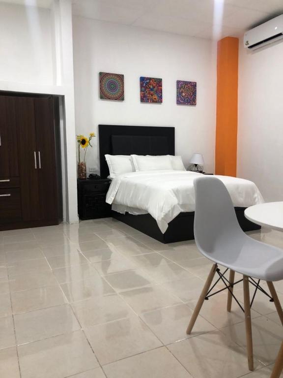Postel nebo postele na pokoji v ubytování Hotel boutique turquesa
