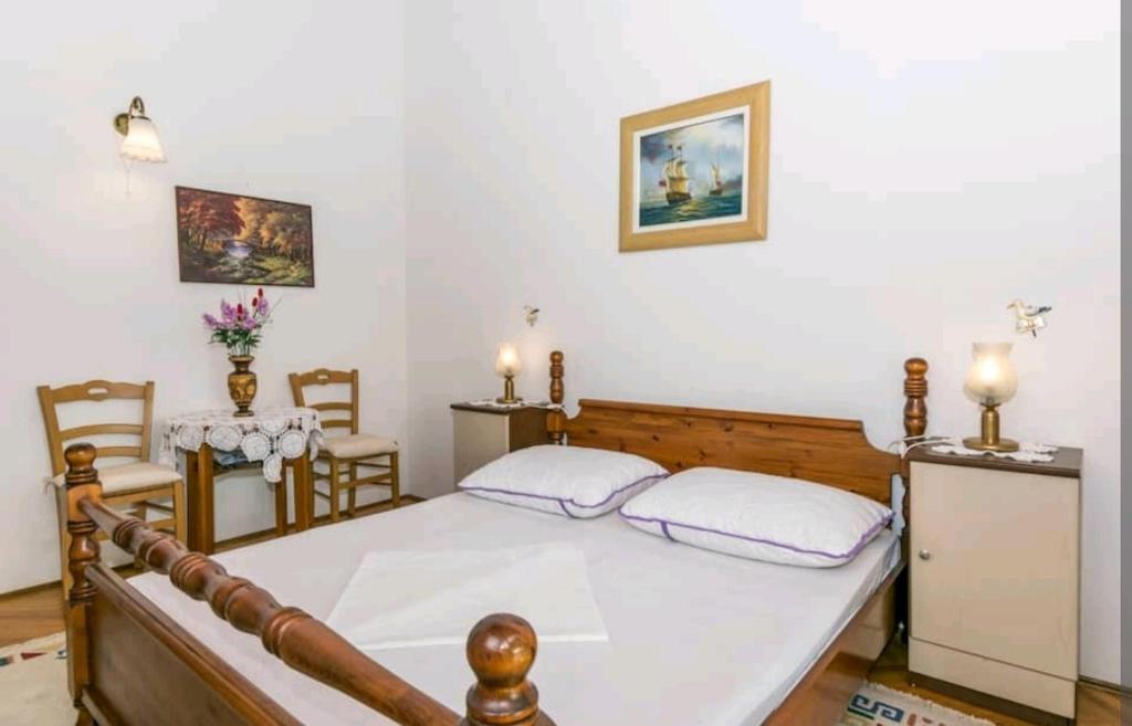 Posteľ alebo postele v izbe v ubytovaní Seaview Escape Stanići II