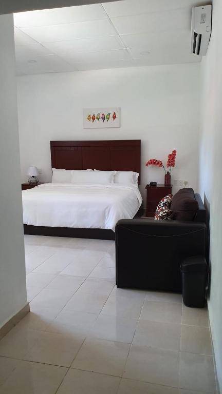 Postel nebo postele na pokoji v ubytování Hotel boutique turquesa