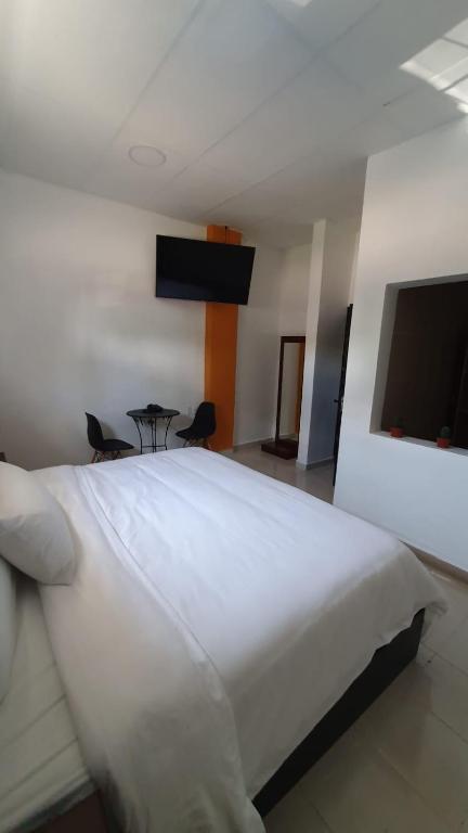 Postel nebo postele na pokoji v ubytování Hotel boutique turquesa
