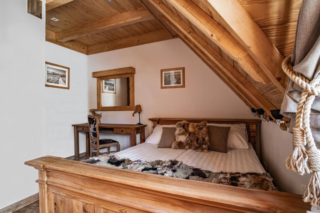 Postel nebo postele na pokoji v ubytování Nosalowski Wypas Jacuzzi & Sauna