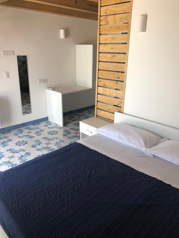 Postel nebo postele na pokoji v ubytování Rena Resort
