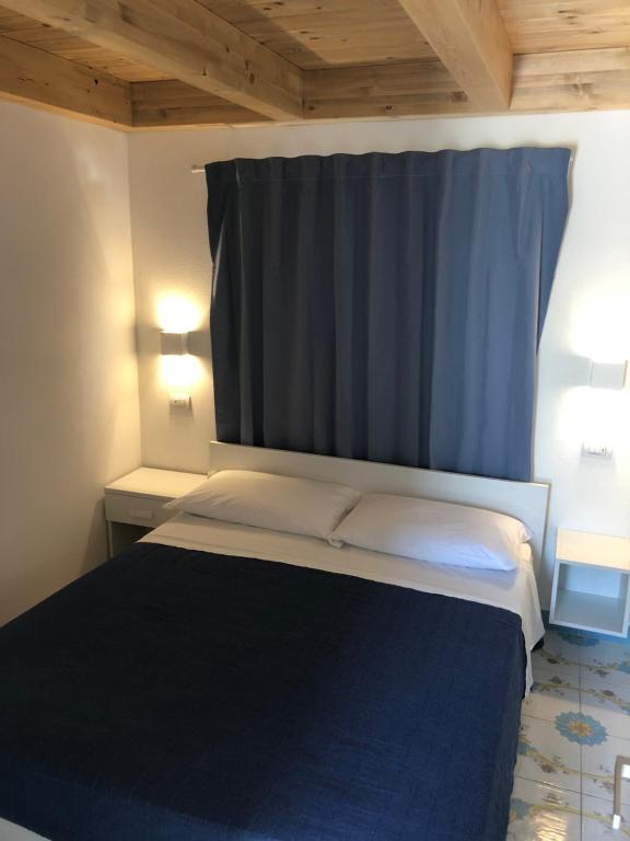 Postel nebo postele na pokoji v ubytování Rena Resort