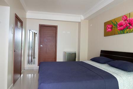 Postel nebo postele na pokoji v ubytování Hotel Andy