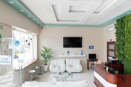 TV a/nebo společenská místnost v ubytování Hotel Andy