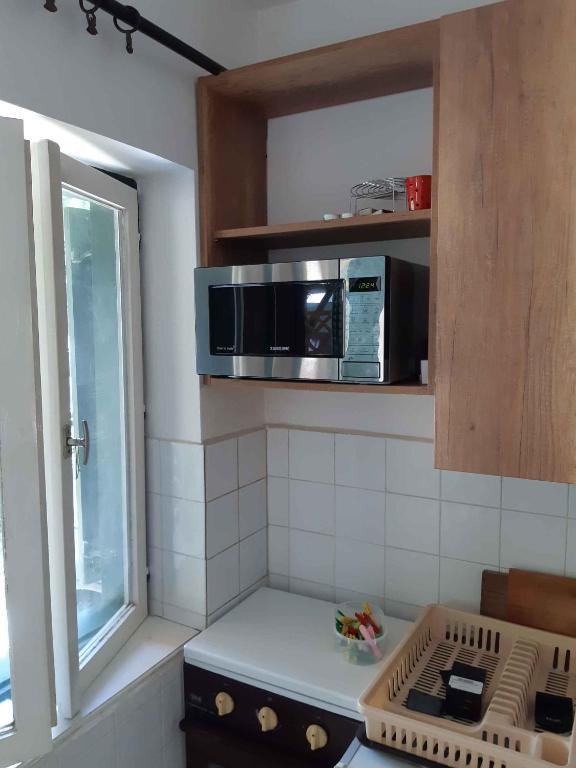 Kuchyňa alebo kuchynka v ubytovaní Holiday home in Balatonmariafürdo 33086