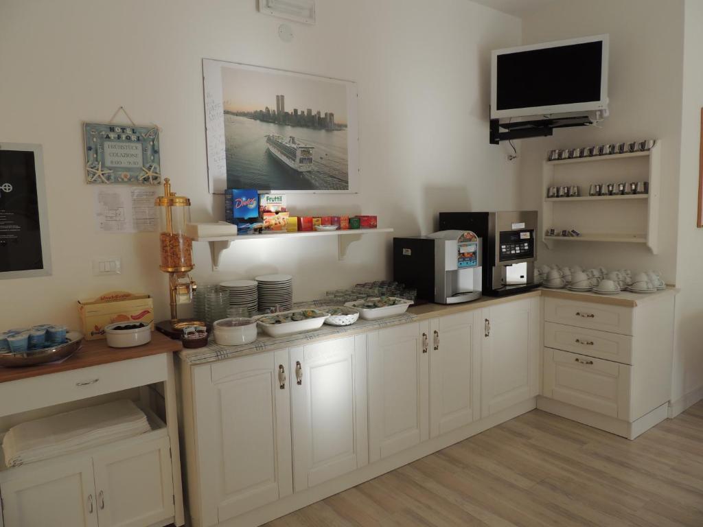 Kuchyň nebo kuchyňský kout v ubytování Hotel ai Fiori