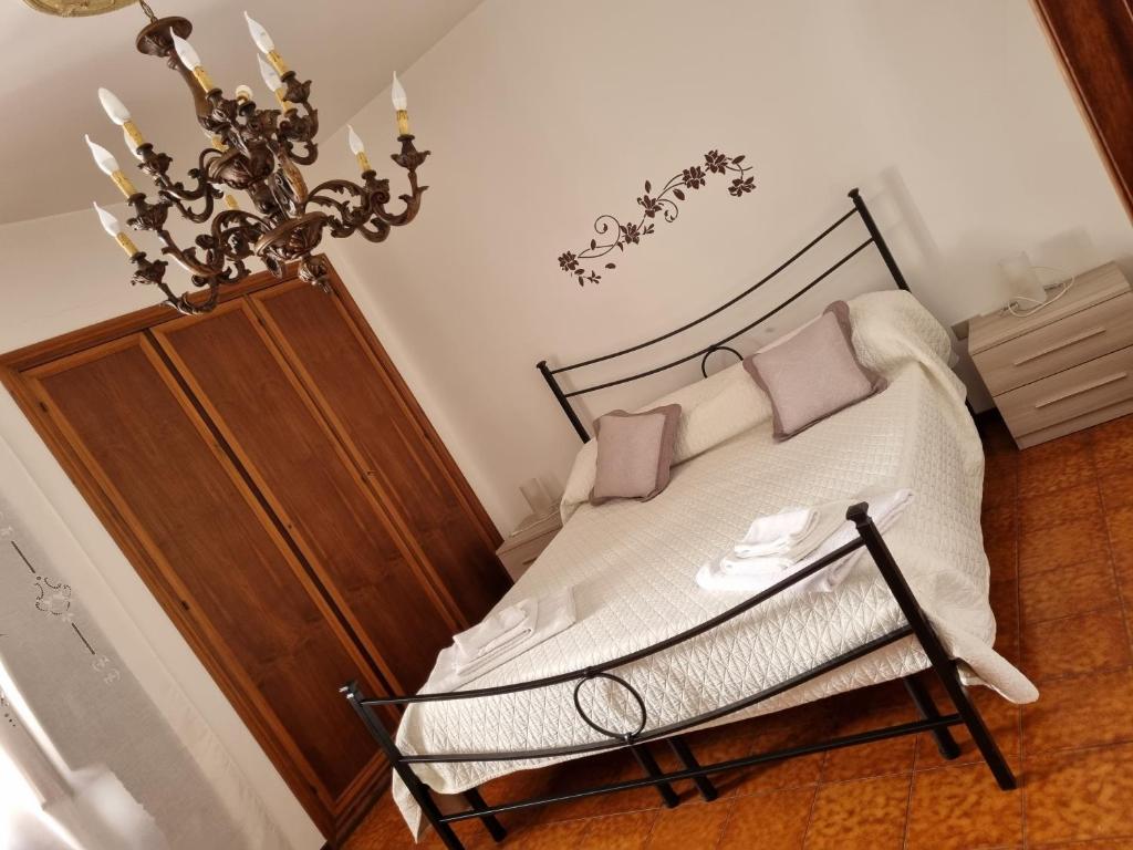 Posteľ alebo postele v izbe v ubytovaní A Casa di Cristina