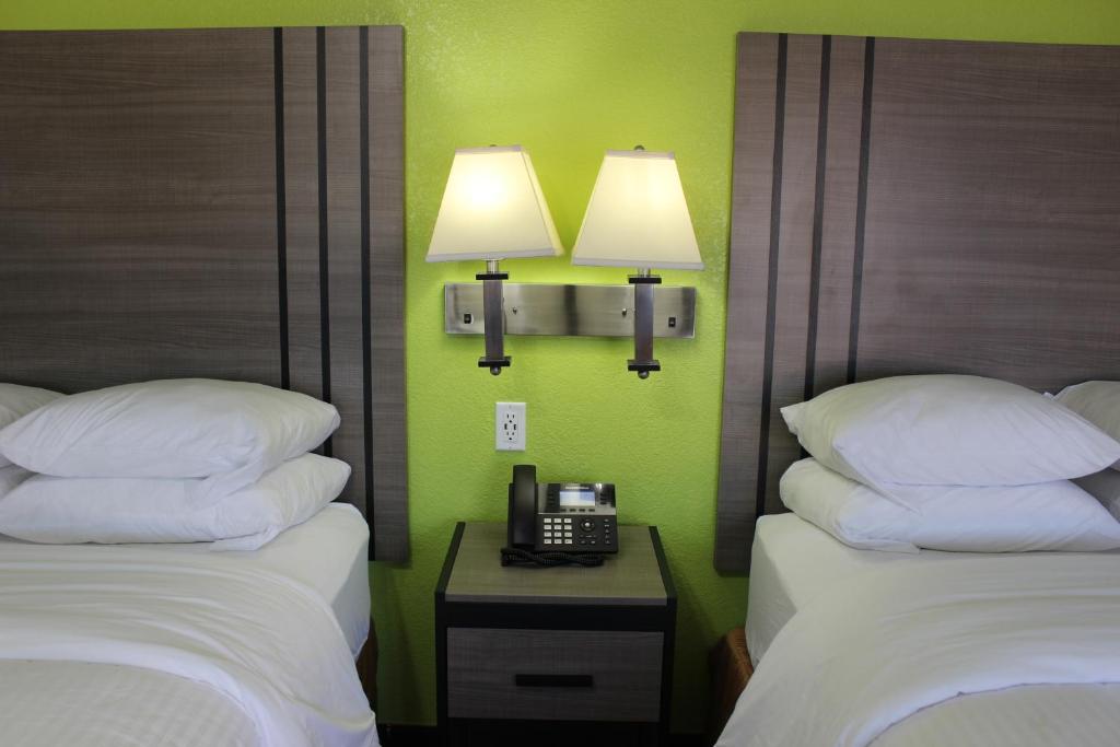 Postel nebo postele na pokoji v ubytování Copa Motel