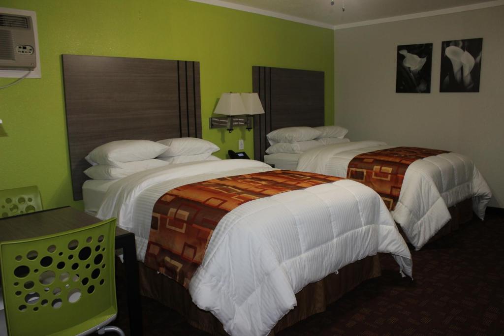 Postel nebo postele na pokoji v ubytování Copa Motel