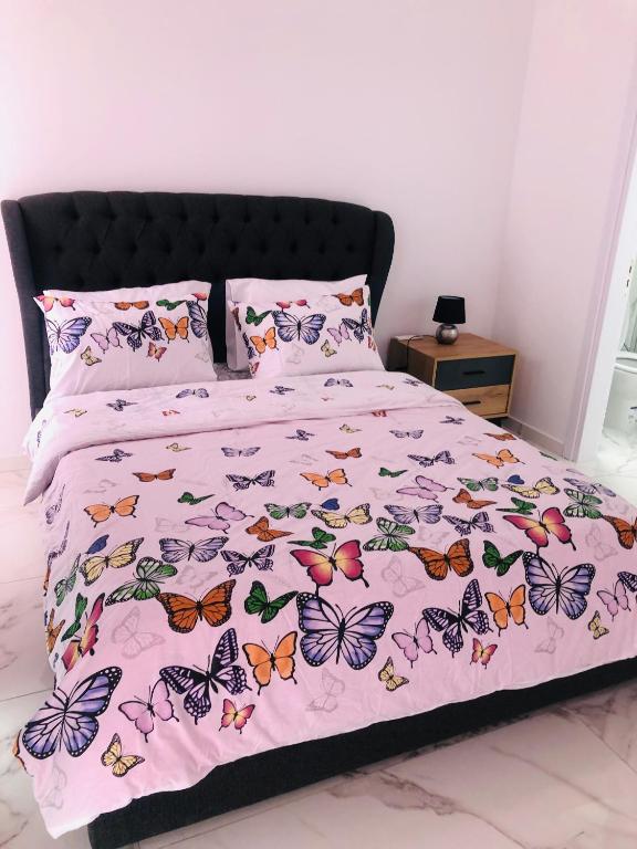 Postel nebo postele na pokoji v ubytování Mobina Villas