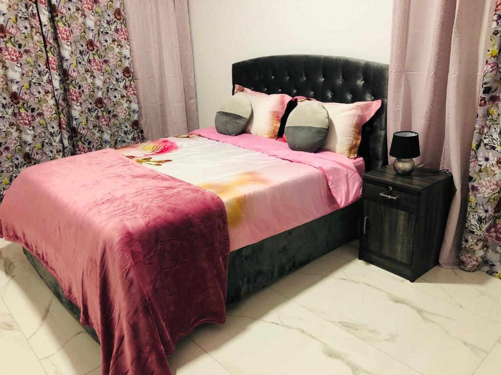 Postel nebo postele na pokoji v ubytování Mobina Villas