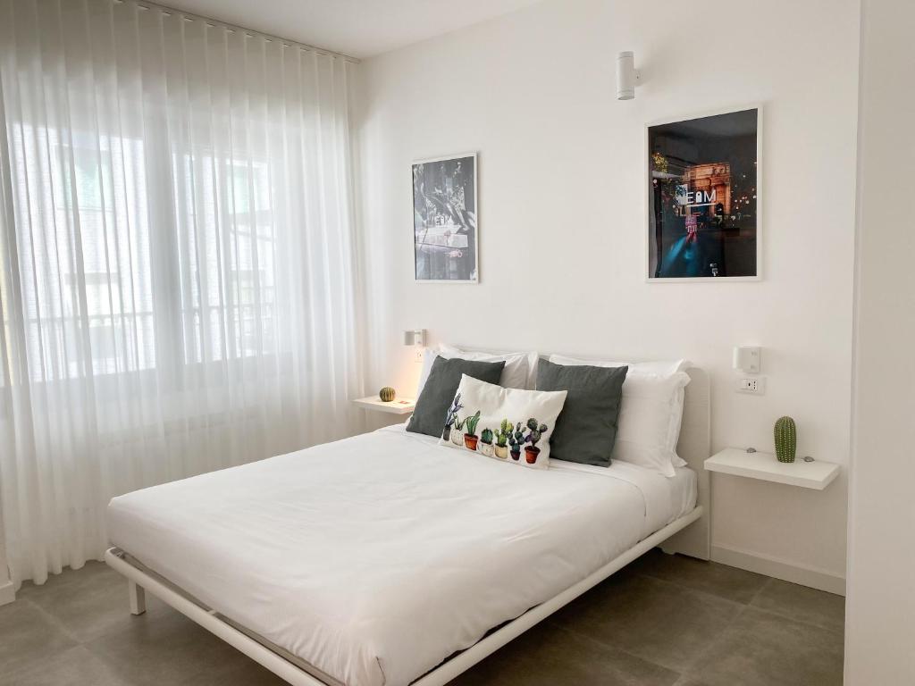 Posteľ alebo postele v izbe v ubytovaní Easy Milano Apartment Navigli
