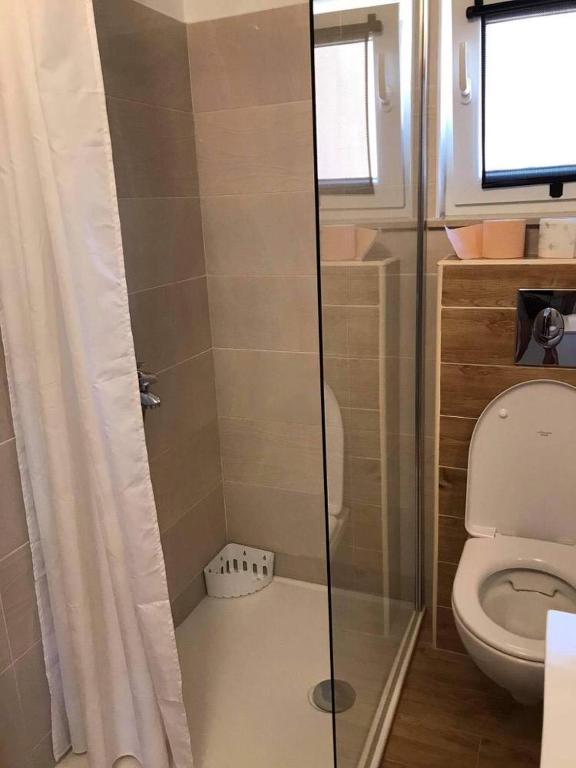 Kúpeľňa v ubytovaní Apartman Arijana s pogledom na more za 6 osoba