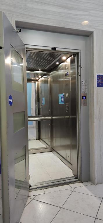 an elevator in a building with its door open at Thalia deco City & Beach Hotel in Hersonissos