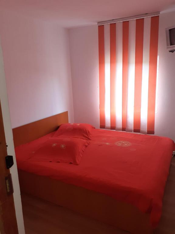 Postel nebo postele na pokoji v ubytování Casa Denisa Vidraru transfgarasan