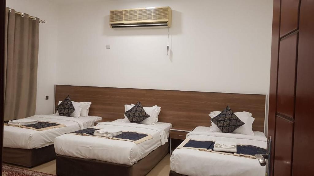 Postel nebo postele na pokoji v ubytování Orient Apartments