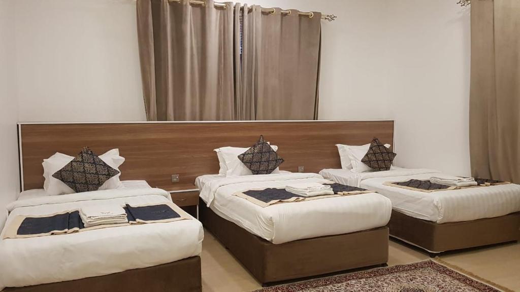 Postel nebo postele na pokoji v ubytování Orient Apartments