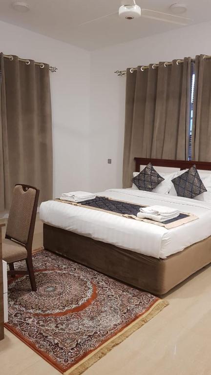 Postel nebo postele na pokoji v ubytování Orient Apartments