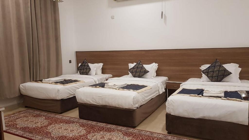 Postel nebo postele na pokoji v ubytování Orient Apartments