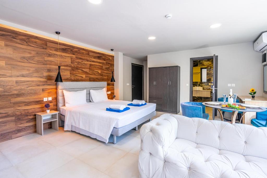 Ένα ή περισσότερα κρεβάτια σε δωμάτιο στο Bamboo Suites Hotel
