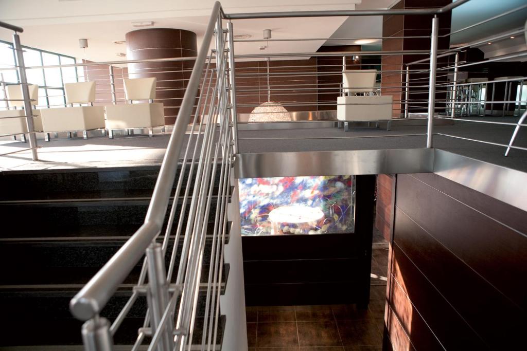 TV a/nebo společenská místnost v ubytování Vercelli Palace Hotel