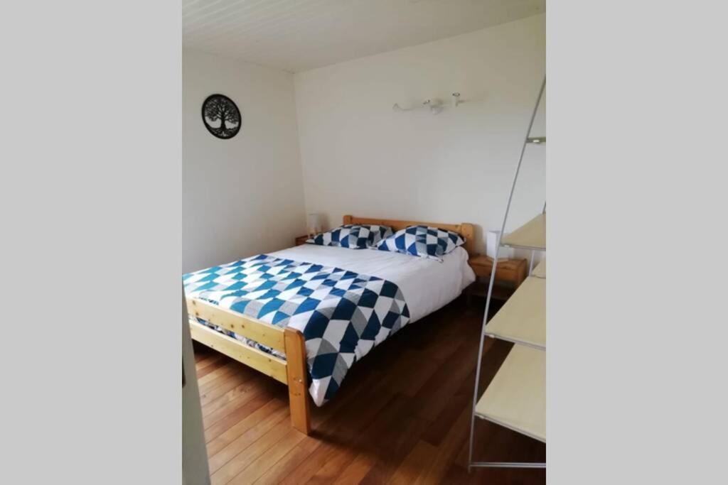 Una cama o camas en una habitación de Gite la Balme