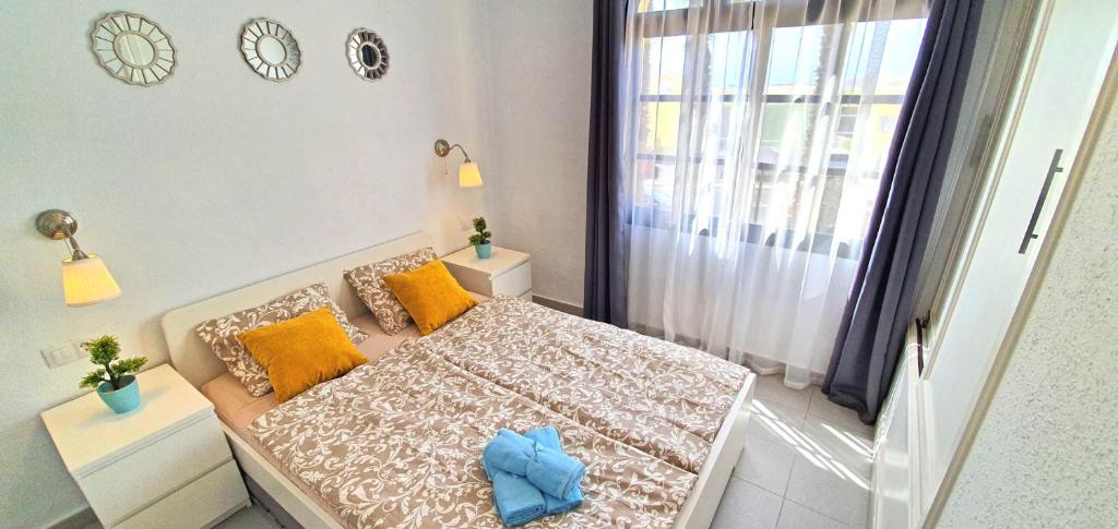 A bed or beds in a room at Ferienhaus PARADISE Costa Calma - max. 4 Personen - WiFi - Pool